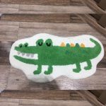 Tapis de bain motif saurien