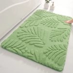 Tapis de bain couleur menthe.