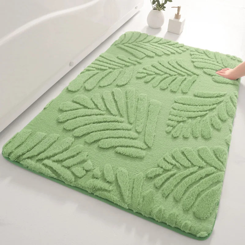 Tapis de bain couleur menthe.